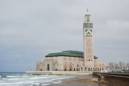 The Hassan II Mosque and its minaret by the Atlantic Ocean in Casablanca