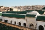 Green-tiled roofs above the medina of Fes