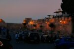 The old city walls of Tangier lit up at dusk