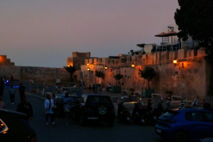 The old city walls of Tangier lit up at dusk